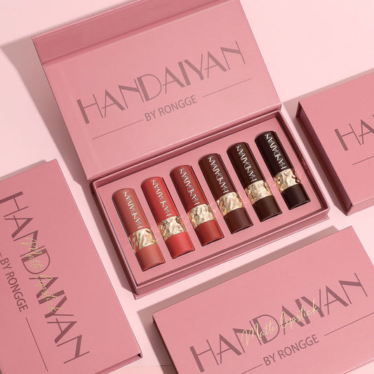 Set of HANDAIYAN lipsticks in a pink box on a light pink background